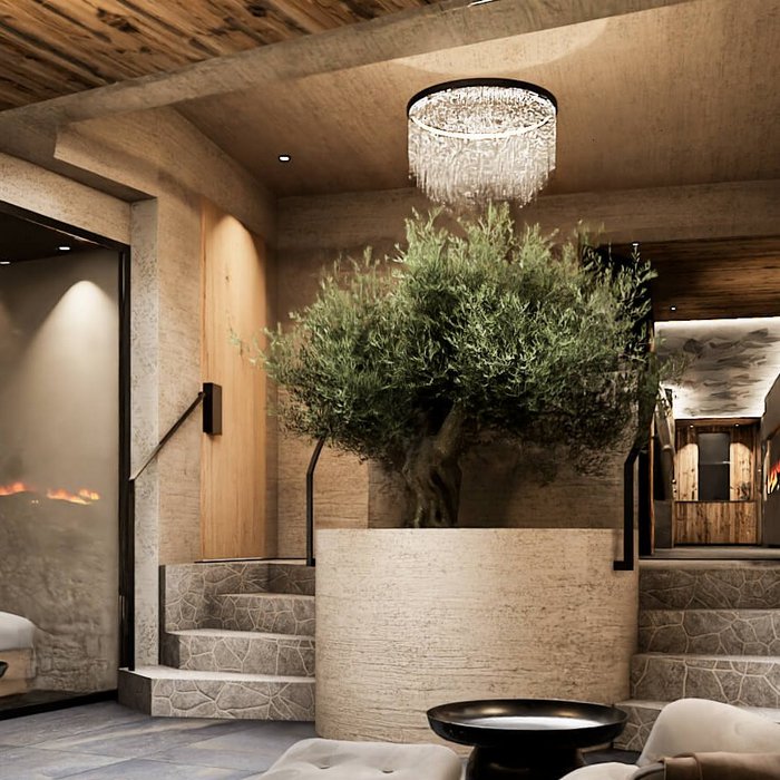 Ligne Mille de luxe facial Modern spa interior with green plant walls and cozy armchairs
