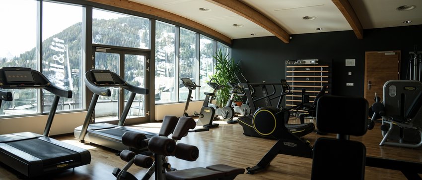 Ligne Mille de luxe facial Gym room with exercise bikes facing windows with mountain view
